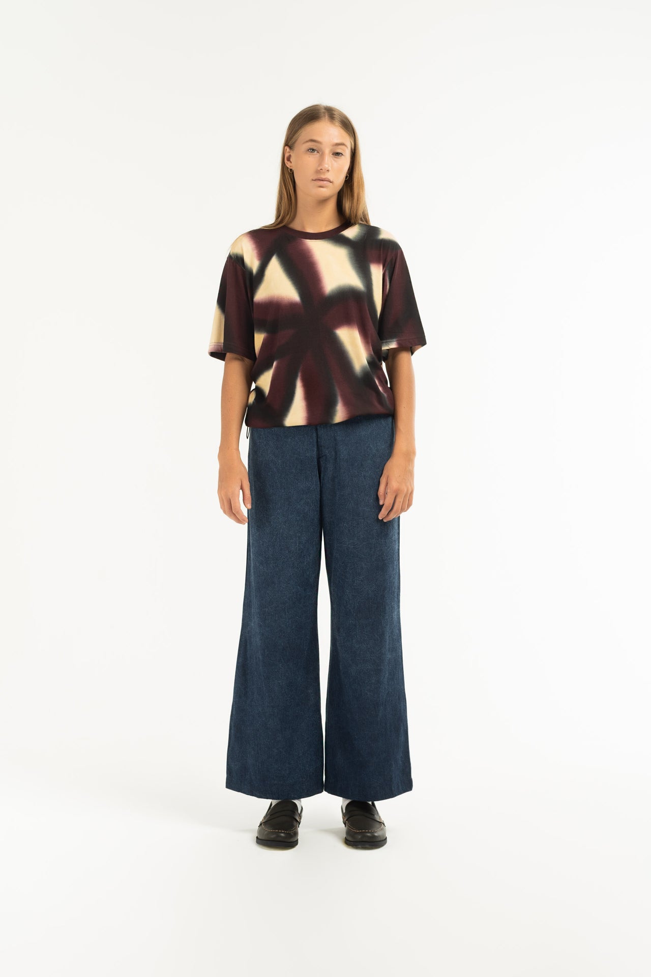 Stonewash Wide Leg Pants are unisex designed and are mid-rise with a wide flare leg that falls just above the ankle. 