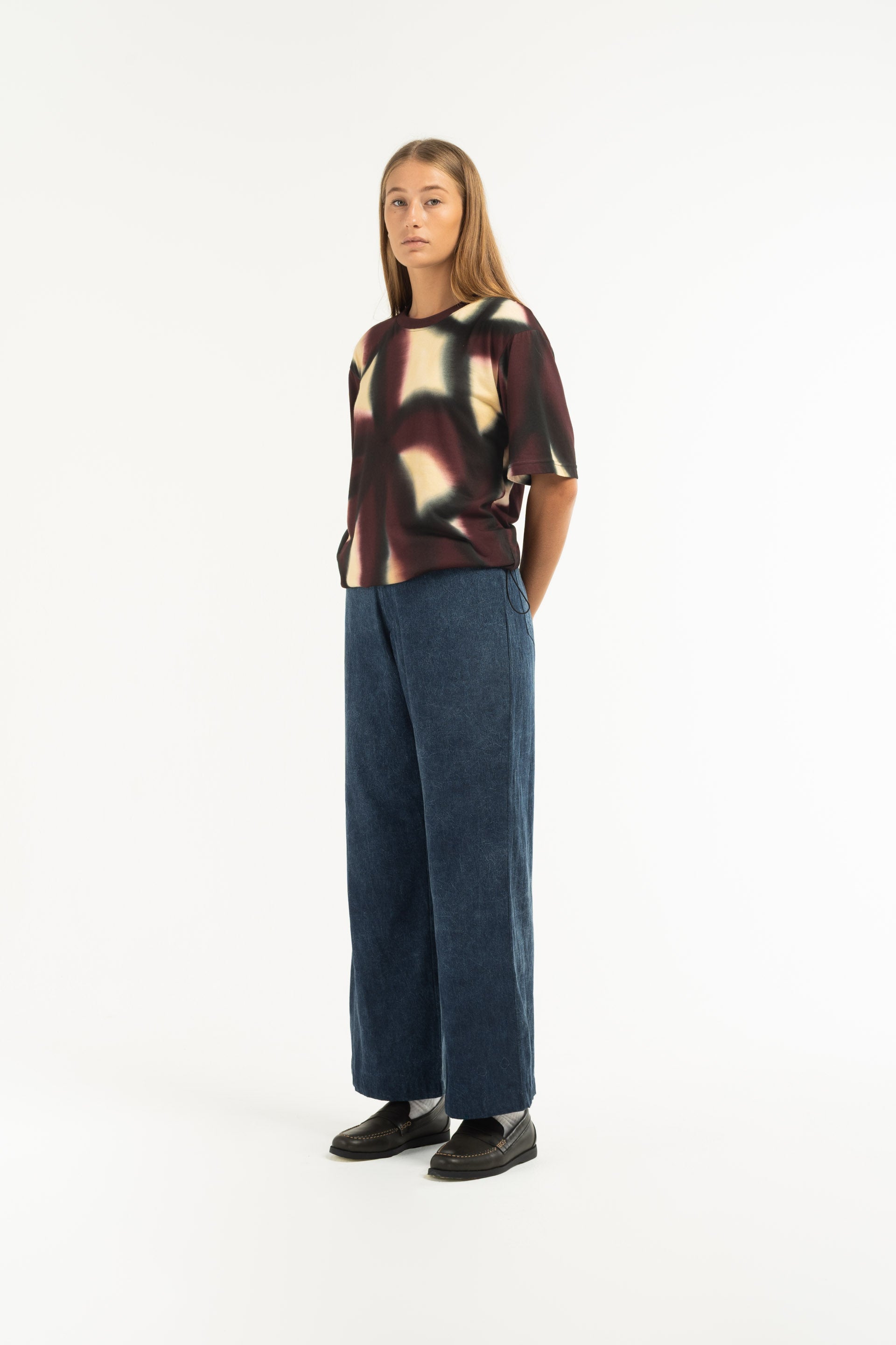 Stonewash Wide Leg Pants are unisex designed and are mid-rise with a wide flare leg that falls just above the ankle. 